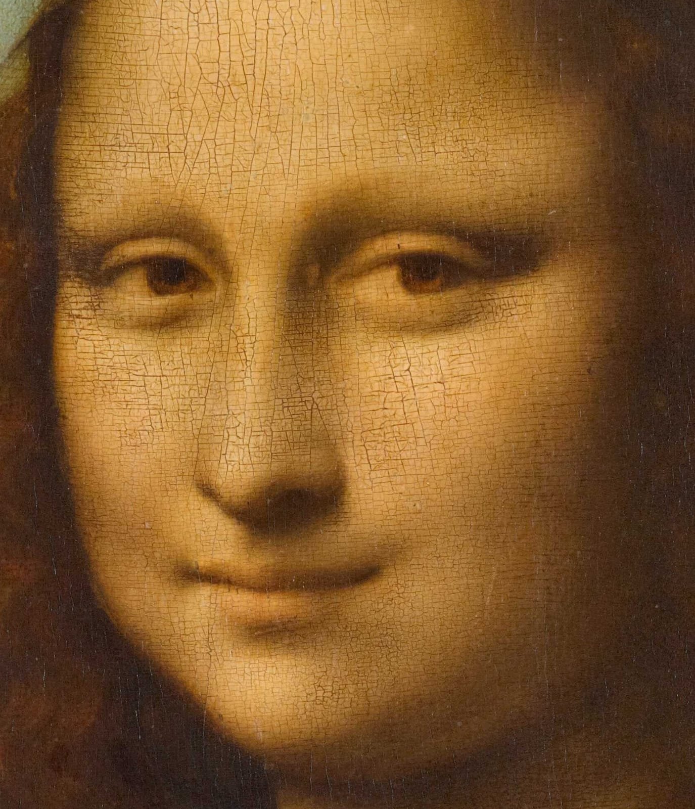 Detail wajah Mona Lisa yang menunjukkan teknik Sfumato, di mana transisi antara bayangan dan warna kulit menyatu halus tanpa garis tegas.